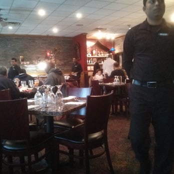Cafe Bombay - Fairly busy Saturday with uber in your face staff taking your pkates before you are done - Indian Near Me - Norcross, Georgia Cafe Bombay - Fairly busy Saturday with uber in your face staff taking your pkates before you are done - Indian Near Me - Norcross, Georgia