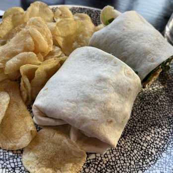 MudPenny - Jimmy Pesto's Wrap (grilled chicken, spinach, pepita pesto, goat cheese, red onion, balsamic vinaigrette, tortilla) - New American Near Me - Ada, Michigan