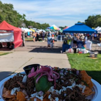 La Reyna Del Sur - a plate of nachos - Food Trucks Near Me La Reyna Del Sur - a plate of nachos - Food Trucks Near Me