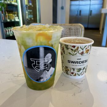 Swadesi Cafe - iced mango & matcha (left), swadesi masala chai (right) - Bakeries Near Me - Chicago, Illinois Swadesi Cafe - iced mango & matcha (left), swadesi masala chai (right) - Bakeries Near Me - Chicago, Illinois