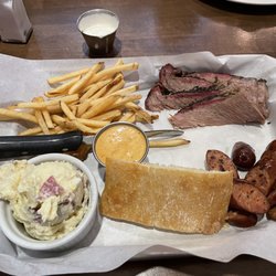 2 meat combo Tri-Tip and sausage with potato salad and fries really good!