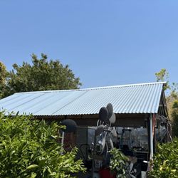 Sam's Home Repairs - Sam installed a 20' by 14' metal roof to replace my old tarp. Excellent job!
