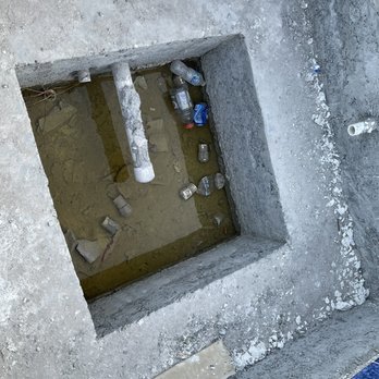 Apollo Pools - a hole in a concrete wall - Pool Cleaners Near Me - Valrico, Florida