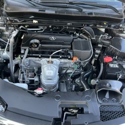 Honda & Acura Service - Engine washed, was very dirty before.