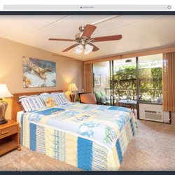 Kona Pacific Condominium - Master bedroom with king size beds. All rooms have access to the lani .