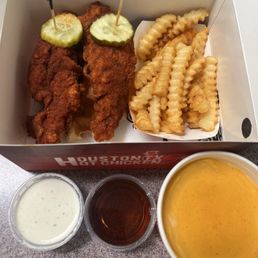Tenders & Waffle meal: spicy, medium, fries, ranch, maple syrup, cheese dip