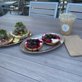 Boil & Bake - Blueberry bagel and salmon bagel. Also Latte - Bagels Near Me - Costa Mesa, California