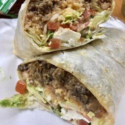Carniceria Loa No 7 - Probably the best burrito in town!!  Carne asada Mexican rice refried beans lettuce and pico with a large chunk of queso fresco!!