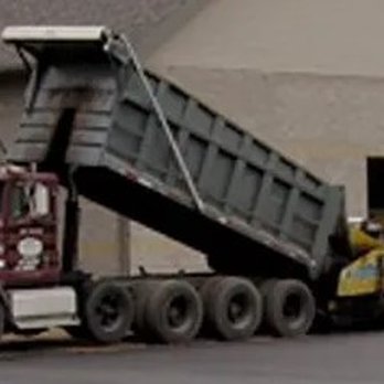 Davis Construction - a dump truck with a loader in the back - Building Supplies Near Me - Portage, Wisconsin