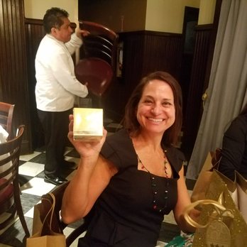 Tran Law Group - Attorney Claudia Porras with her present for Christmas! - Immigration Law Near Me - Westminster, California