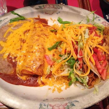 Ixtapa Restaurant - Enchillada with two tacos on soft corn tortillias. The black plate was the first thing I noticed... - Mexican Near Me - Sultan, Washington Ixtapa Restaurant - Enchillada with two tacos on soft corn tortillias. The black plate was the first thing I noticed... - Mexican Near Me - Sultan, Washington
