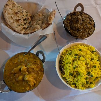 Angara India Spice Grill - Naan bread, coconut chicken curry. Lamb saag and rice palao. - Indian Near Me - Las Vegas, Nevada Angara India Spice Grill - Naan bread, coconut chicken curry. Lamb saag and rice palao. - Indian Near Me - Las Vegas, Nevada