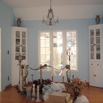 Mauricio Construction - a living room with blue walls - General Contractors Near Me Mauricio Construction - a living room with blue walls - General Contractors Near Me