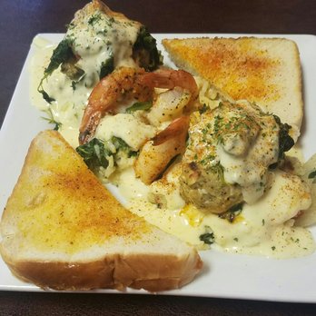 Wishbone Cafe - Bayou Classic! Cajun rice, crab cakes, Cajun shrimp, and spinach all topped with a cream sauce and served with Cajun bread. - Seafood Near Me - Montgomery, Alabama Wishbone Cafe - Bayou Classic! Cajun rice, crab cakes, Cajun shrimp, and spinach all topped with a cream sauce and served with Cajun bread. - Seafood Near Me - Montgomery, Alabama