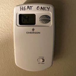 Thermostat in the room - heat only, no cooling. Thermostat in the room - heat only, no cooling.