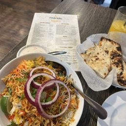 Lamb Biriyani, Garlic Naan, and Mango Margarita. Lamb Biriyani, Garlic Naan, and Mango Margarita.