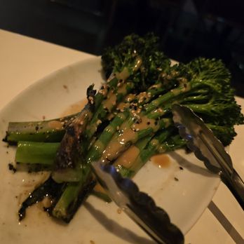 Stripsteak - Broccolini. Cooked crisp-tender. Yum! - Steakhouses Near Me - Honolulu, Hawaii Stripsteak - Broccolini. Cooked crisp-tender. Yum! - Steakhouses Near Me - Honolulu, Hawaii