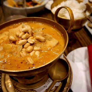 Nicky's Thai Kitchen - Massaman Curry: potatoes, peanut sauce, coconut milk, massaman curry paste topped with whole roasted peanuts ($19.50 for chicken or pork). - Thai Near Me - Pittsburgh, Pennsylvania Nicky's Thai Kitchen - Massaman Curry: potatoes, peanut sauce, coconut milk, massaman curry paste topped with whole roasted peanuts ($19.50 for chicken or pork). - Thai Near Me - Pittsburgh, Pennsylvania