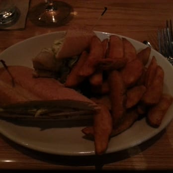 BJ's Restaurant & Brewhouse - Parmesan crusted chicken sandwich with wedge cut fries. - Breweries Near Me - Phoenix, Arizona