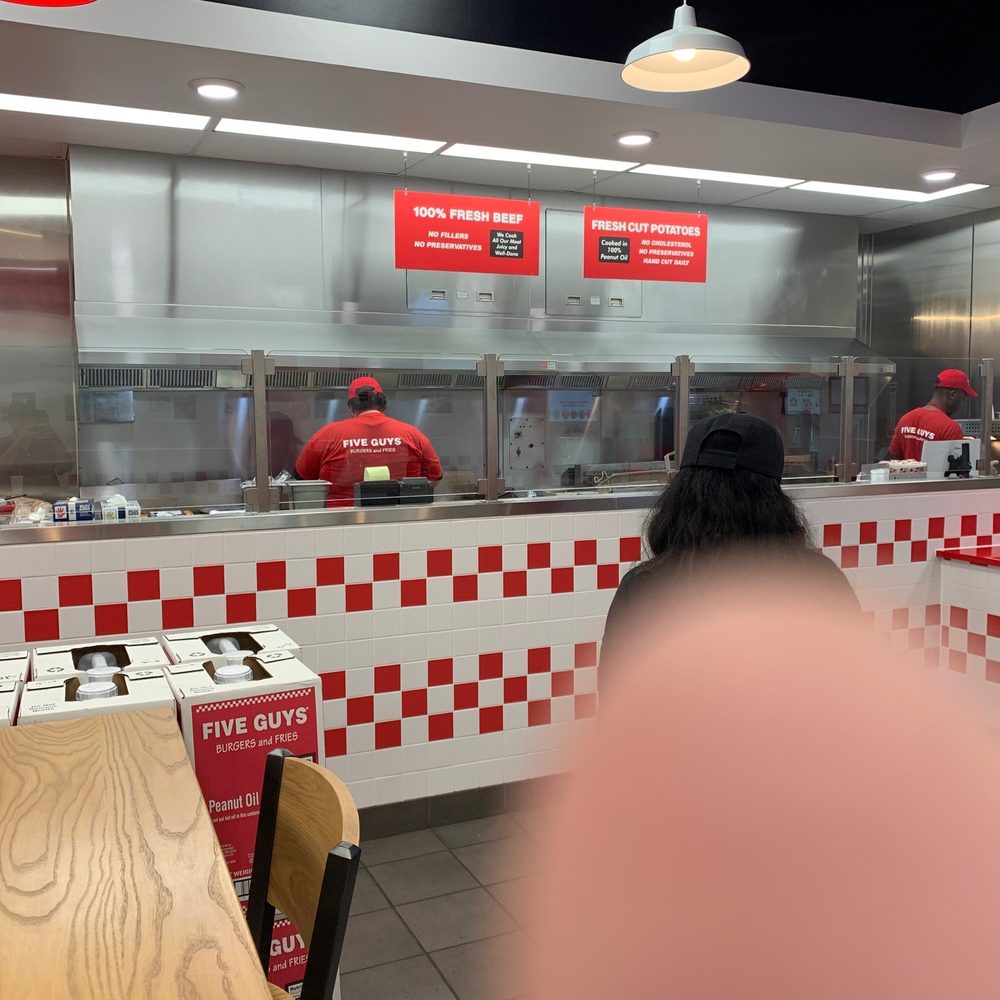 a restaurant with a checkered counter