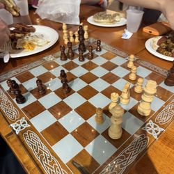 Mad River Coffee House & Roaster Room - Chess at one of the tables