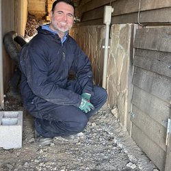 Jape Services - Inspecting a crawlspace at an install