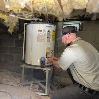 The Classic Plumber - Checking ohms reading on elements for no hot water - Plumbing Near Me The Classic Plumber - Checking ohms reading on elements for no hot water - Plumbing Near Me
