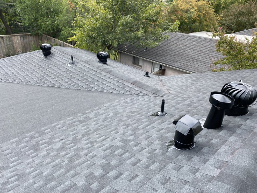 Slide of AM Roofing Company