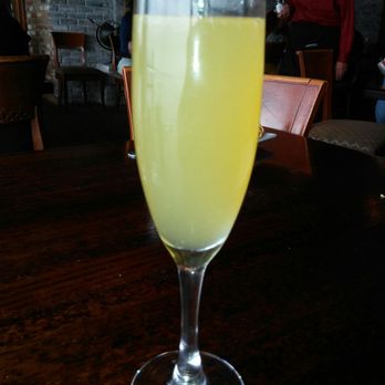 Rusty Pelican - Mimosa - Seafood Near Me - Tampa, Florida