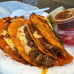 Luchita’s - Order of Birria tacos (4) served with onion , red onion ,cilantro , red & green salsa
