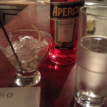 Bar Del Corso - aperol spritz, aperol bottle, water. - Italian Near Me - Seattle, Washington
