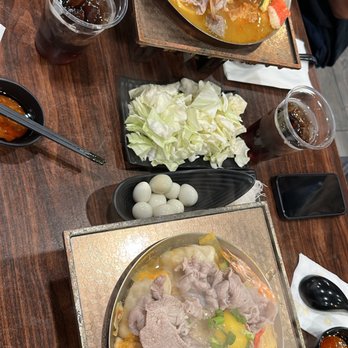 Tasty Pot - Top: #8 - Thai flavor hot soup, bottom: #7 - kimchi dumpling hot soup - Hot Pot Near Me - Elk Grove, California