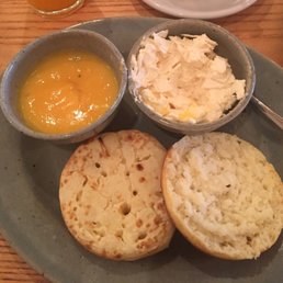 Crumpets w coconut yogurt and tangelo curds.