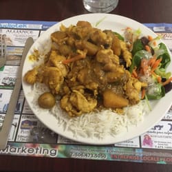Tresors & Delices - Chicken Curry on a bed of basmati rice!