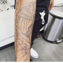 Chicano Tattoo & Piercings