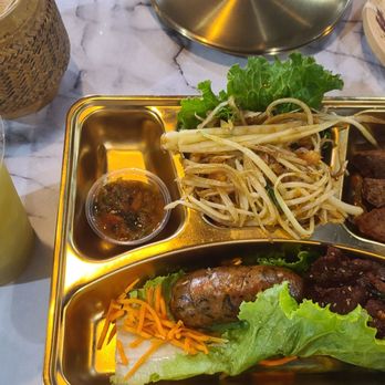 So Saap - Famous lao sampler plate with papaya salad, fried meatball, sausage and 2 versions of beef jerky - Thai Near Me - San Diego, California So Saap - Famous lao sampler plate with papaya salad, fried meatball, sausage and 2 versions of beef jerky - Thai Near Me - San Diego, California