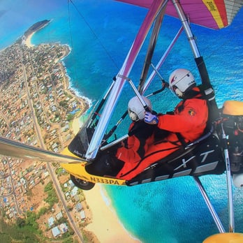 GoSky Hawaii - Hawaiian blue waters on the North Shore of O'ahu and most western point while powered Hang Gliding with Tom as my instructor :) - Hang Gliding Near Me - Waialua, Hawaii GoSky Hawaii - Hawaiian blue waters on the North Shore of O'ahu and most western point while powered Hang Gliding with Tom as my instructor :) - Hang Gliding Near Me - Waialua, Hawaii