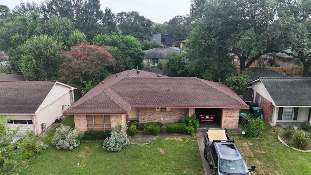 Slide of Newfield Roofing