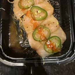 Yellowtail Sashimi and terribly rolled rolls.