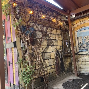 Dar Salam - Lovely dead plant mural with live plant! - Middle Eastern Near Me - Portland, Oregon