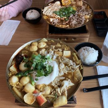 Pot on Fire - Back: Taiwanese Spicy Beef  Front: Milky Curry Pot - Taiwanese Near Me - Las Vegas, Nevada