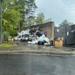 The continuing build up of trash OUTSIDE of the perfectly good dumpster... these pictures just go to show how poorly the property is kept.