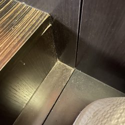 Motel 6 - Meridian - Dust, dirt, debris, crumbs, dead skin, and god knows what else near the head of the bed.