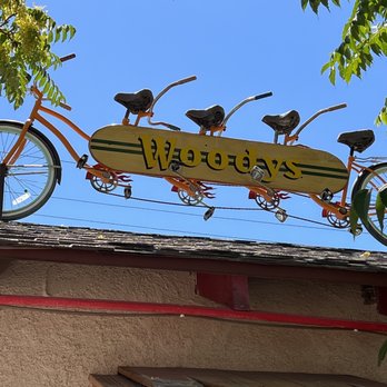Woodys - a bicycle on top of a building - Burgers Near Me - Fallon, Nevada Woodys - a bicycle on top of a building - Burgers Near Me - Fallon, Nevada