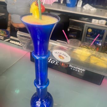 Island Time Floats - a blue vase with a cocktail in it - Tiki Bars Near Me - Las Vegas, Nevada