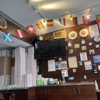 Nolita Pizza - The dining area has more tables - Pizza Near Me - New York, New York