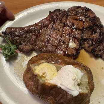Texas Corral - Stevensville - 1 lbs bone in ribeye steak with baked potato - American Near Me - Stevensville, Michigan
