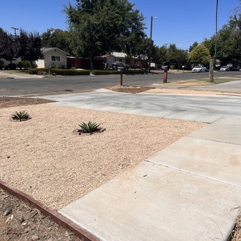 J&A Landscaping - I had him install California gold rock with a layer of rolled roofing for weed control and rock barrier. - Landscaping Near Me