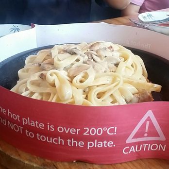 Petit Potato - Chicken Alfredo. Served on a sizzling plate but not enough sauce - Taiwanese Near Me - Toronto, Ontario