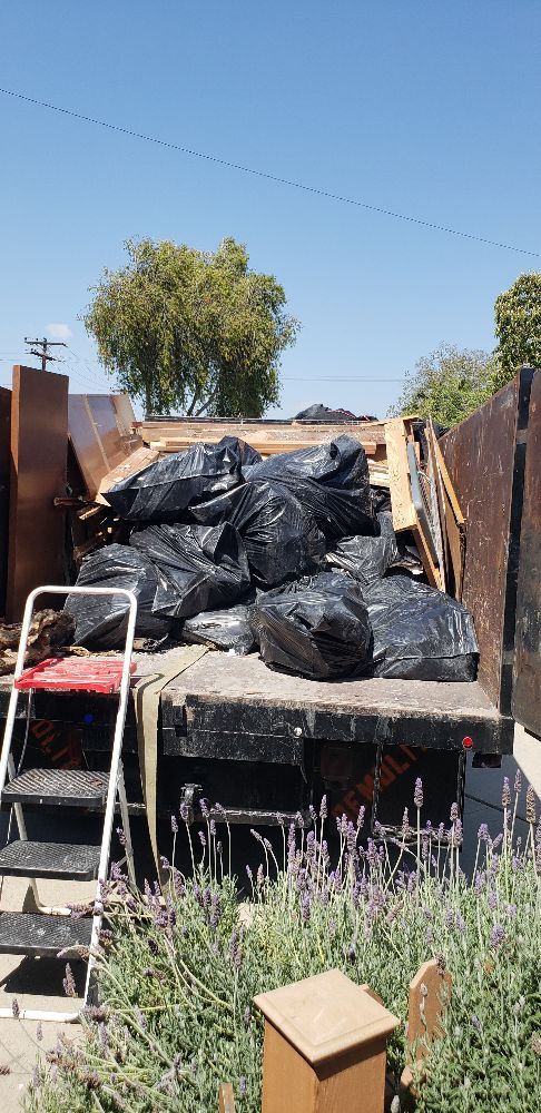 Slide of Alex's Hauling & Demo